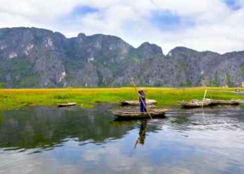 Icca Landscape With Boat, Mountains And Clouds Van Long Natural Reserve 128855443 Piter Ha Son