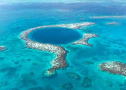 Iucn Iii Aerial View Of The Blue Hole In The Caribbean Off The Coast Of Belize 168067598 Tami Freed